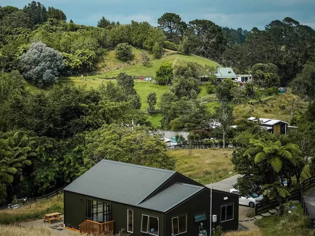 Sanctuary Hill buildings nestled among green hills and native bush