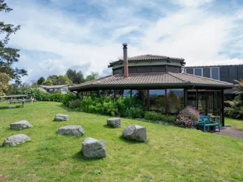Tauhara retreat building and its surrounding lawn