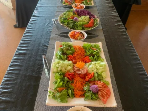 A shared meal of colourful salads at the retreat