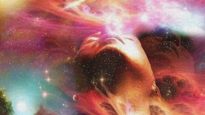 Psychedelic artwork of a human face merging with stars and colourful cosmic clouds